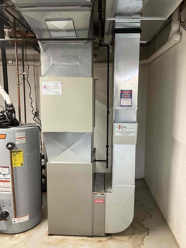 Provided estimate for air conditioning system replacement of non-operational 1998 unit located outside the residence. Assessed existing HVAC infrastructure including basement furnace installation, electrical panel capacity, and utility connections to determine compatibility requirements for new equipment installation.
