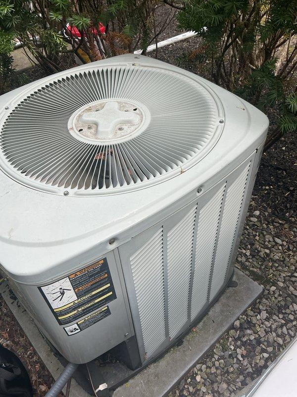 Completed annual cooling maintenance on two outdoor condensing units. Performed comprehensive inspection of both systems, including examination of condenser coils, fan operation, refrigerant lines, and electrical connections. Units were found to be in operational condition with standard wear appropriate for equipment age. Documented equipment condition through photographic records showing proper installation on concrete pads with adequate drainage and clearance for airflow.