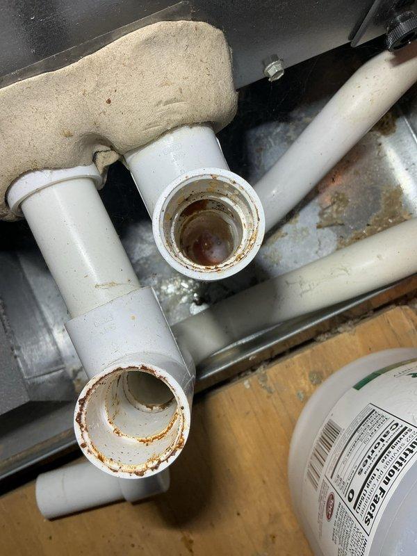Completed comprehensive HVAC maintenance callback including flushing and clearing the condensate drain line, cleaning the evaporator coil, and performing full system inspection. Addressed drainage concerns with thorough line cleaning to prevent future clogs, verified proper airflow and system operation, and reviewed all maintenance work and system status with customer to ensure complete satisfaction.