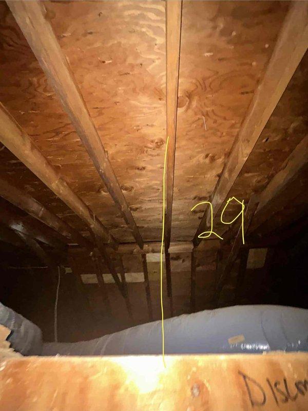 Completed estimate for replacement of 16-year-old air conditioning system with leaking attic-mounted condenser and rusted drain pan. Inspected attic installation, documented existing HVAC equipment condition including cabinet unit, ductwork, and compromised condensate drainage system. Provided replacement options for immediate system changeover due to failed components and active refrigerant leak.