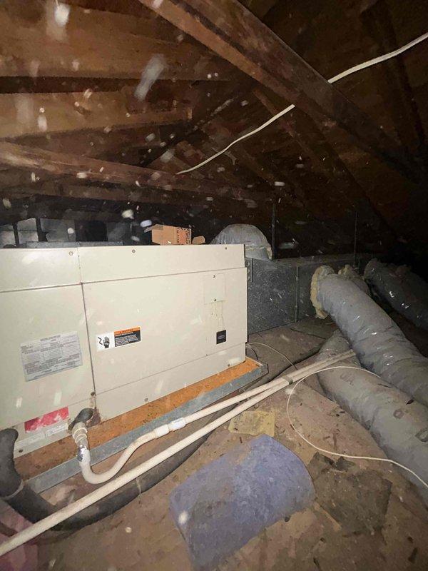 Completed estimate for replacement of 16-year-old air conditioning system with leaking attic-mounted condenser and rusted drain pan. Inspected attic installation, documented existing HVAC equipment condition including cabinet unit, ductwork, and compromised condensate drainage system. Provided replacement options for immediate system changeover due to failed components and active refrigerant leak.