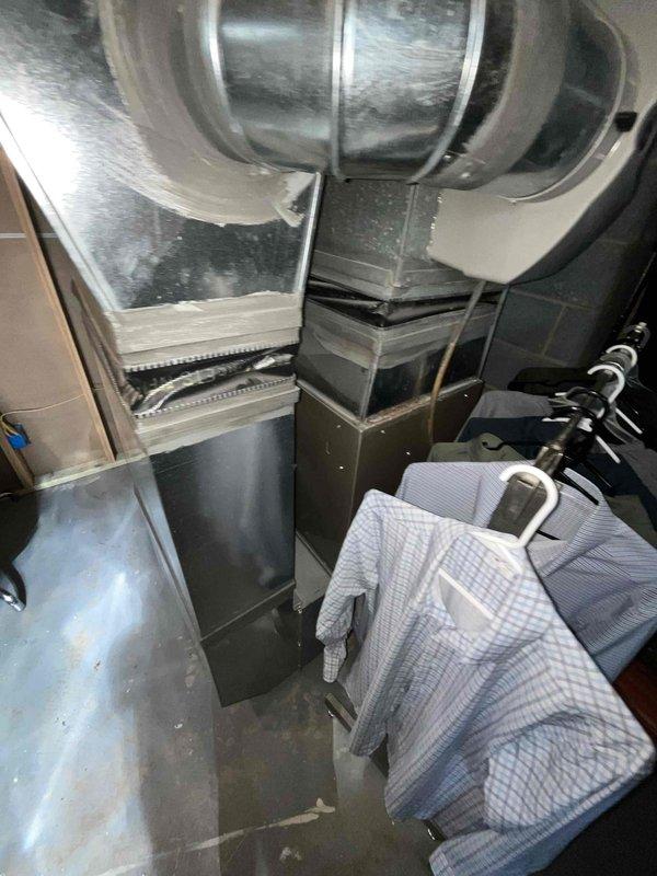 Conducted on-site evaluation for complete HVAC system replacement in basement installation. Assessed existing 14-year-old natural gas furnace and non-operational air conditioning unit, including inspection of Carrier humidifier, ductwork, and air handler configuration. Documented current equipment conditions, measured existing plenum and supply duct specifications, and provided comprehensive replacement estimate for new heating and cooling system.