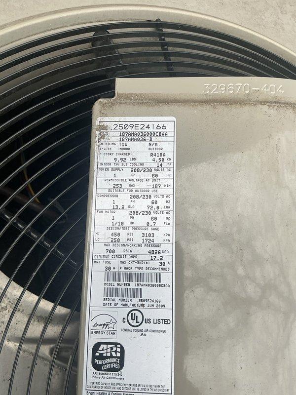 Responded to no-cooling call on 10-year-old outdoor condensing unit. Diagnosed communication failure between furnace, thermostat, and air conditioning system preventing compressor startup. Inspected Goodman R410A unit manufactured June 2009, verified electrical connections at outdoor unit, and troubleshot control wiring between indoor and outdoor equipment to restore proper system communication and cooling operation.