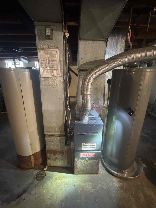 Conducted comprehensive assessment of 16-year-old residential air conditioning system that experienced complete failure requiring urgent replacement. Evaluated existing Goodman furnace and HVAC infrastructure in basement mechanical room to determine compatibility requirements and replacement specifications. Documented current equipment conditions, including flexible metallic ductwork connections, electrical and plumbing configurations, and overall system layout. Provided detailed estimate for complete AC unit replacement, accounting for existing furnace integration, ductwork modifications if needed, and proper sizing requirements for single-family residential application.