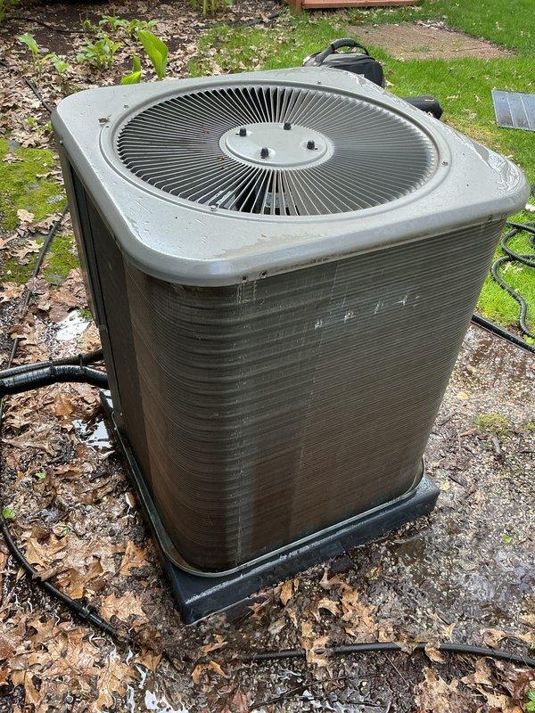 Completed annual preventive maintenance on residential split system air conditioning unit. Performed comprehensive inspection of outdoor condenser unit, verified proper operation of condenser fan motor and compressor, checked refrigerant line insulation integrity, and confirmed electrical connections were secure. Cleaned condenser coils, inspected unit mounting and pad condition, and documented system condition with photographs. Unit operating within normal parameters at time of service completion.