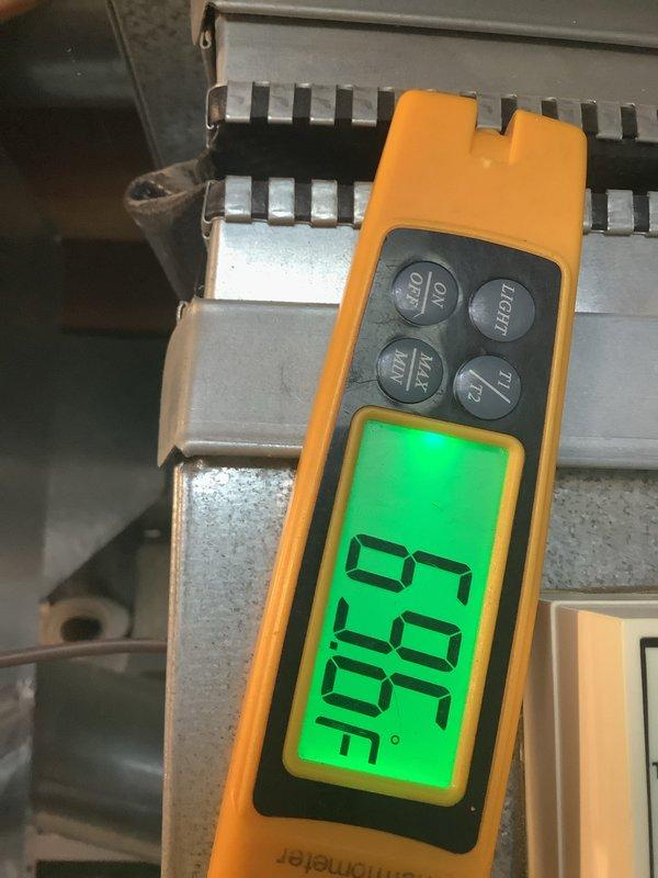 Completed annual cooling maintenance on residential air conditioning system. Performed system diagnostics and measurements, documented outdoor condenser unit condition showing debris accumulation and bent fins on coil requiring attention, and verified operational parameters. Unit operational at time of service completion.