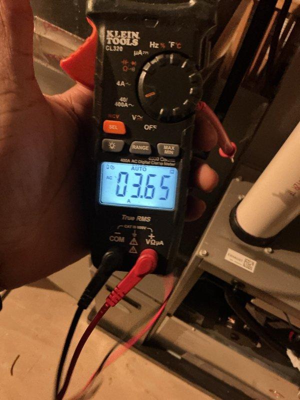 Completed scheduled air conditioning maintenance service. Performed electrical diagnostics using digital multimeter to verify system amperage and proper electrical function. Inspected evaporator coil assembly and filter media, confirmed mesh screening intact with proper airflow path. Checked drain line routing and gasket seal integrity on access panel.