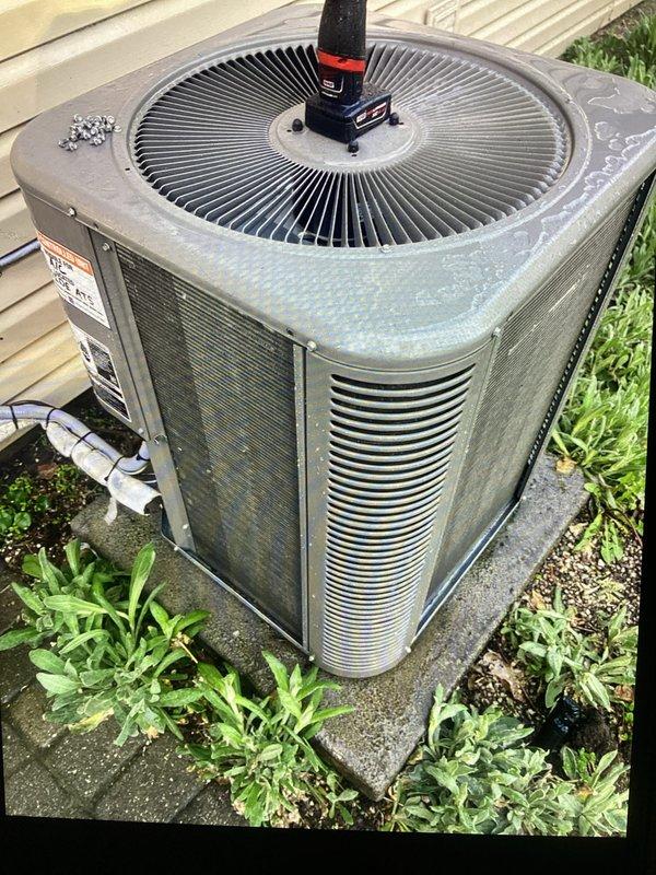 Performed annual cooling maintenance on outdoor condensing unit. Inspected condenser coils and found moderate to heavy accumulation of dirt, dust, and debris throughout the fins. Cleaned condenser coils to restore proper airflow and heat transfer efficiency. Trimmed back vegetation encroaching on unit perimeter to maintain adequate clearance for optimal operation and serviceability. Verified unit operation and confirmed system functioning properly upon completion.