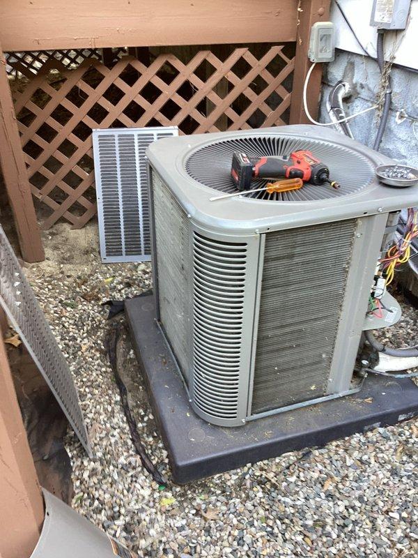 Performed routine preventative maintenance on residential split system air conditioning unit. Conducted comprehensive inspection including refrigerant pressure readings using manifold gauge set, verified electrical connections at disconnect box, inspected condenser coil condition, and confirmed proper fan operation. System operating within normal parameters with no deficiencies noted.