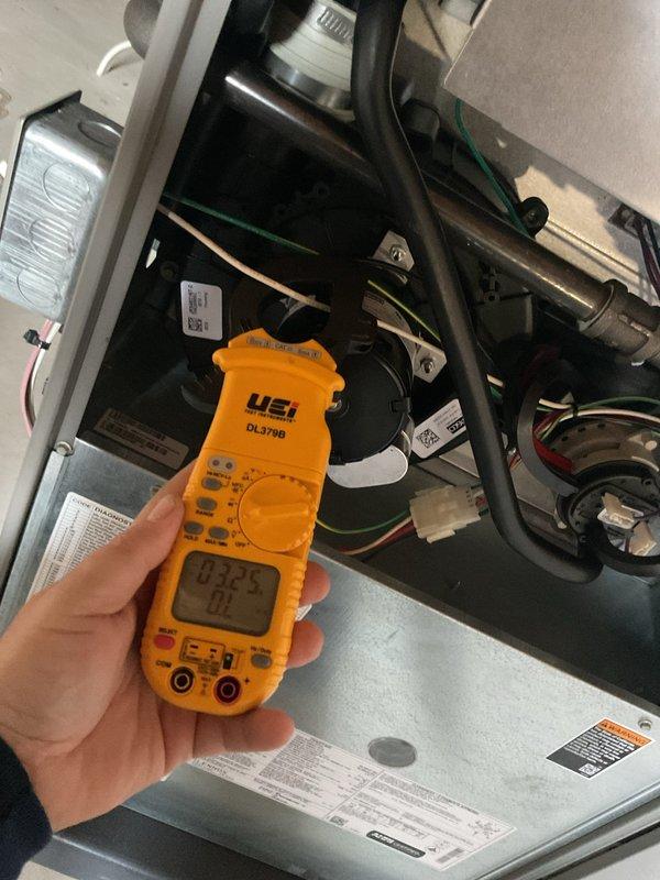 Completed annual cooling maintenance on HVAC system. Inspected heavily soiled air filter showing significant accumulation of dust and debris, restricting airflow through the unit. Performed electrical diagnostics using clamp meter to verify proper amperage draw on blower motor and system components. Replaced dirty air filter and completed standard preventive maintenance checklist to ensure optimal system performance for the cooling season.