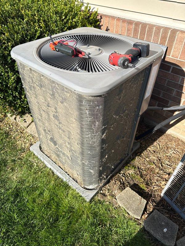 # HVAC Maintenance - ACM Completed

Performed routine Air Care Maintenance on residential split system air conditioning unit. Conducted comprehensive inspection of outdoor condensing unit, verifying operational status and overall system condition. Unit exterior showed normal weathering consistent with outdoor exposure; cleaned accessible surfaces and confirmed proper placement on concrete pad. Inspected fan grille assembly, coil housing, and cabinet panels for structural integrity. Verified adequate clearance around unit for proper airflow and assessed surrounding landscape for potential obstructions. All components found in satisfactory working condition with no immediate service needs identified. System ready for continued operation through cooling season.