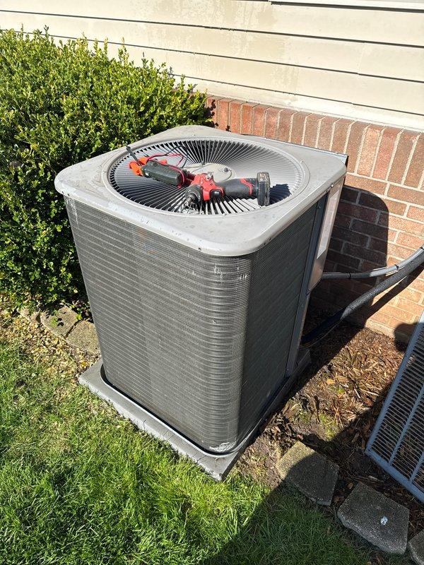 # HVAC Maintenance - ACM Completed

Performed routine Air Care Maintenance on residential split system air conditioning unit. Conducted comprehensive inspection of outdoor condensing unit, verifying operational status and overall system condition. Unit exterior showed normal weathering consistent with outdoor exposure; cleaned accessible surfaces and confirmed proper placement on concrete pad. Inspected fan grille assembly, coil housing, and cabinet panels for structural integrity. Verified adequate clearance around unit for proper airflow and assessed surrounding landscape for potential obstructions. All components found in satisfactory working condition with no immediate service needs identified. System ready for continued operation through cooling season.