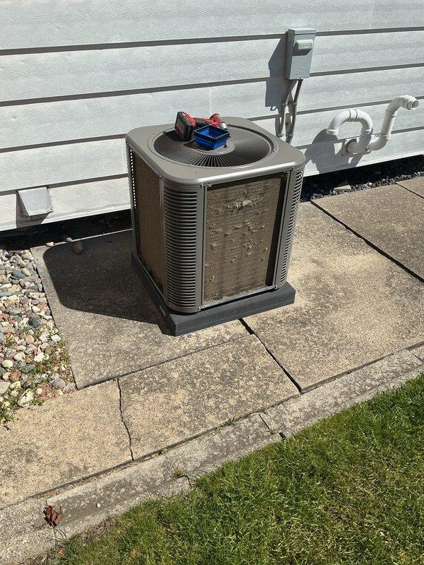 Performed comprehensive air conditioning tune-up on residential outdoor condenser unit. Completed full system inspection including refrigerant line examination, electrical connections verification, and condenser coil assessment. Replaced air filter and ensured proper airflow throughout system. Unit was uncovered and prepared for cooling season operation. All components tested and operating within normal parameters upon completion.