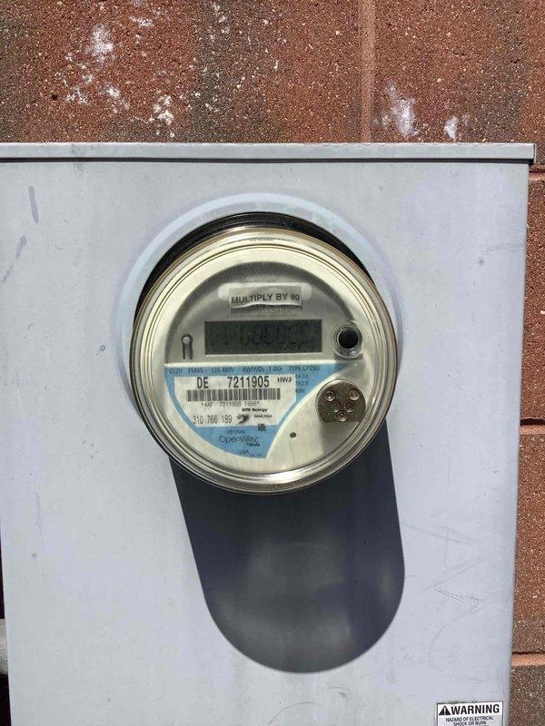 Conducted on-site assessment at commercial restaurant facility to provide generator installation estimate. Evaluated existing electrical infrastructure including main service panel with 20-amp breaker configuration and utility metering system. Documented current electrical capacity via Centron watthour meter and inspected available panel space for generator transfer switch integration. Photographed electrical distribution components to determine proper sizing requirements and connection points for standby generator system installation.
