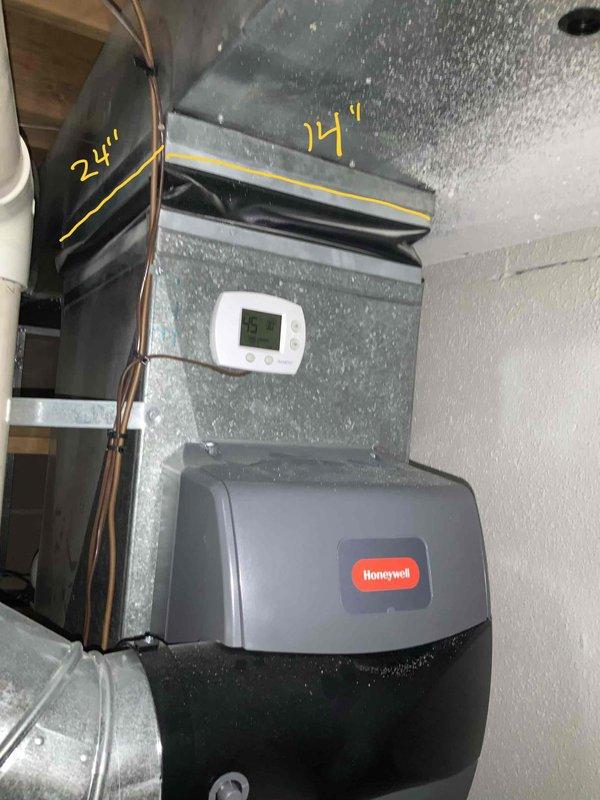 Conducted pre-installation site assessment and measurements for quoted air purification system installation. Measured existing ductwork dimensions and available cabinet space in basement utility area, confirming 89-inch vertical clearance and 14-inch horizontal duct dimensions at proposed installation location. Documented current HVAC system configuration including existing Honeywell humidifier mounted on supply plenum and verified adequate space for integration of Air Scrubber by Aerus unit and Healthy Climate PureAir PCO3-16-16 system into existing ductwork.
