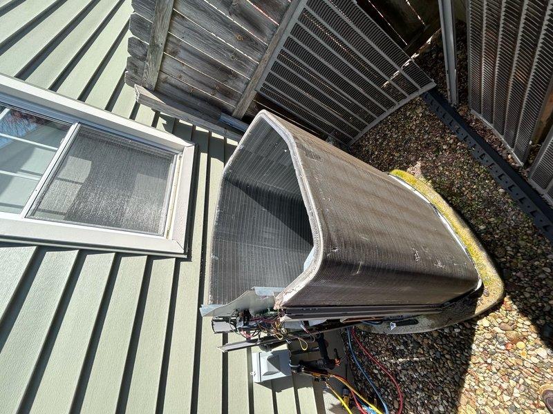 Completed scheduled Air Care Cooling maintenance on rooftop-mounted residential air conditioning condenser unit. Performed standard ACM inspection, referenced manufacturer's temperature and pressure specifications, documented system condition with photos showing unit placement and surrounding area with minor debris accumulation.