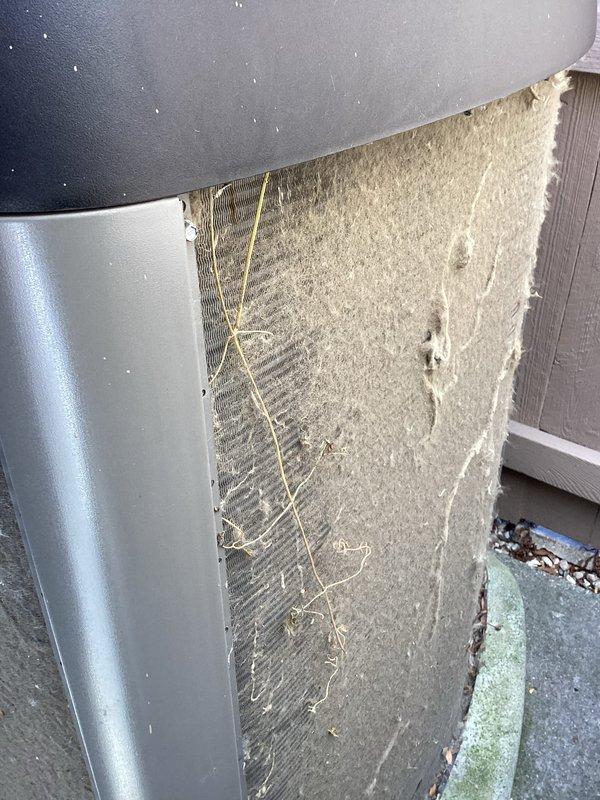 Completed annual cooling maintenance on residential HVAC system. Replaced heavily soiled air filter showing significant dust and debris accumulation, installed new evaporator pad, and performed standard ACM inspection of outdoor condenser unit including verification of refrigerant lines, electrical connections, and overall system operation.