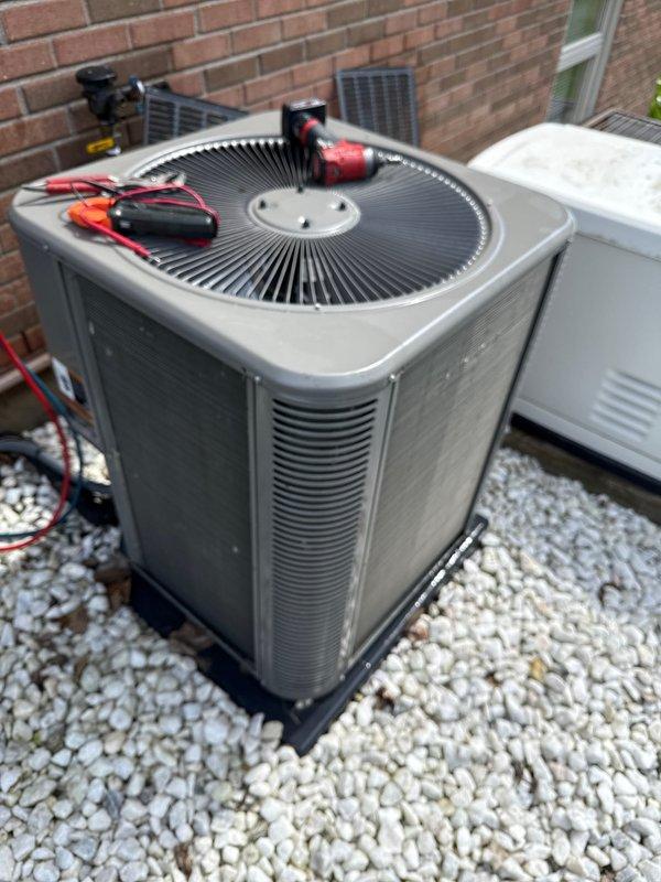 Performed annual maintenance on outdoor condensing unit. Conducted electrical diagnostics using multimeter to verify proper voltage and amperage readings across system components. Inspected condenser coil and found 2-5 spots requiring filter cleaning attention. Tested system operation and confirmed unit running within manufacturer specifications. All electrical connections secure and operational parameters normal.