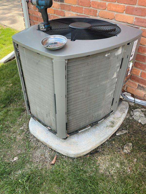 Completed annual fall heating maintenance on residential HVAC system. Performed comprehensive inspection of outdoor condenser unit, including cleaning of exterior panels, verification of fan operation, and securing of all hardware components. Unit found in satisfactory operating condition with routine maintenance tasks completed per manufacturer specifications.
