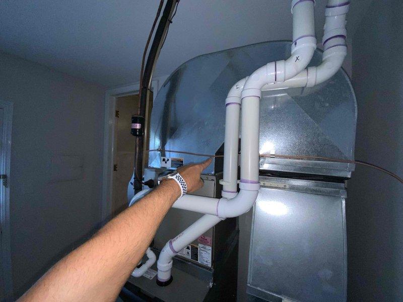 Completed estimate for air conditioning system replacement on 16-year-old unit. Customer recently had furnace installed and is now seeking replacement of aging AC component. Assessed existing HVAC installation including air handler, ductwork configuration, and condensate drainage system with PVC piping. Provided replacement options and recommendations for new air conditioning system to integrate with recently installed furnace.