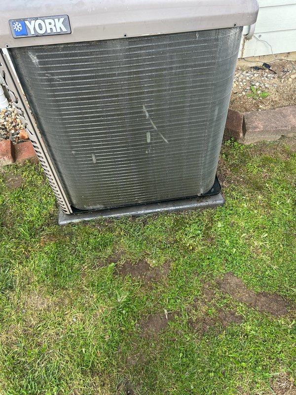 Completed annual cooling maintenance on York residential condenser unit. Performed comprehensive system inspection, cleaned heavily soiled condenser coils showing significant dirt and debris accumulation, replaced air filter and evaporator pad, and verified proper system operation upon completion.