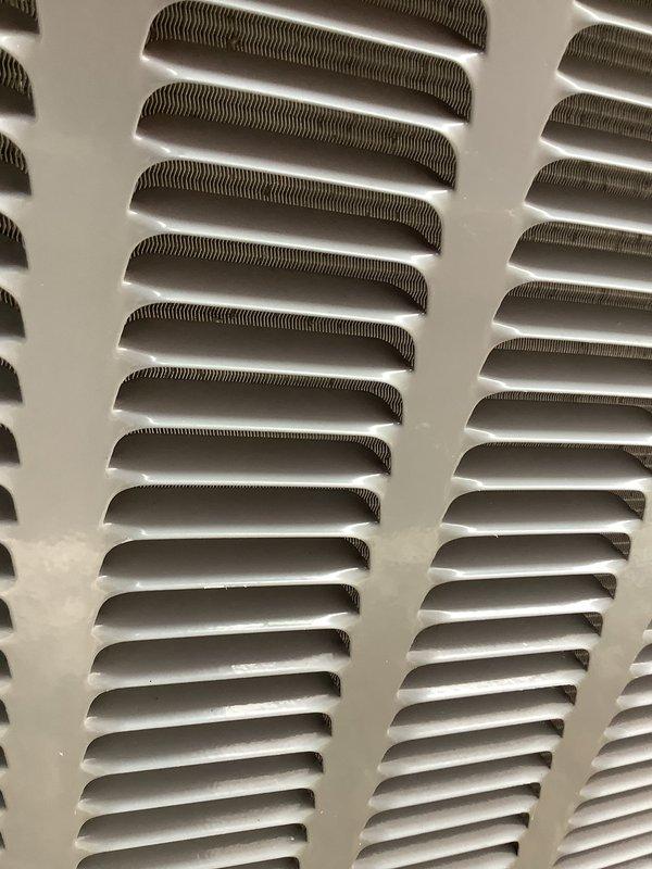 Completed annual cooling maintenance on residential split system. Inspected and tested all major components using digital multimeter to verify proper electrical readings and system operation. Replaced air filter and evaporative cooler pad as needed. Cleaned return air grille which showed moderate dust accumulation on louvers. All equipment operating within normal parameters upon completion of preventive maintenance service.