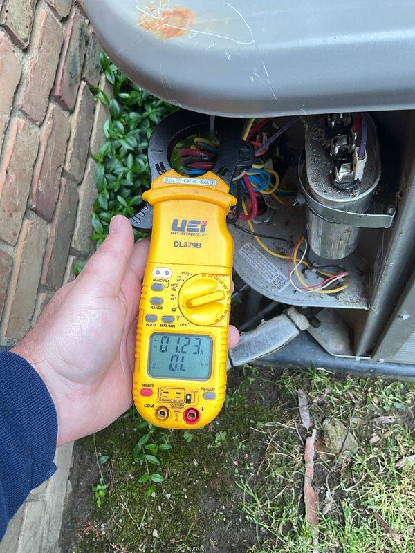 Responded to return service call for air conditioning maintenance. Upon arrival, performed comprehensive electrical diagnostics on outdoor condensing unit using digital multimeter. Measured voltage and amperage readings at compressor and capacitor connections to verify proper system operation. Tested capacitor functionality and confirmed all electrical components within manufacturer specifications. Inspected wire connections and terminals for secure contact. Documented electrical readings for service records. System operating normally with all measurements within acceptable parameters.