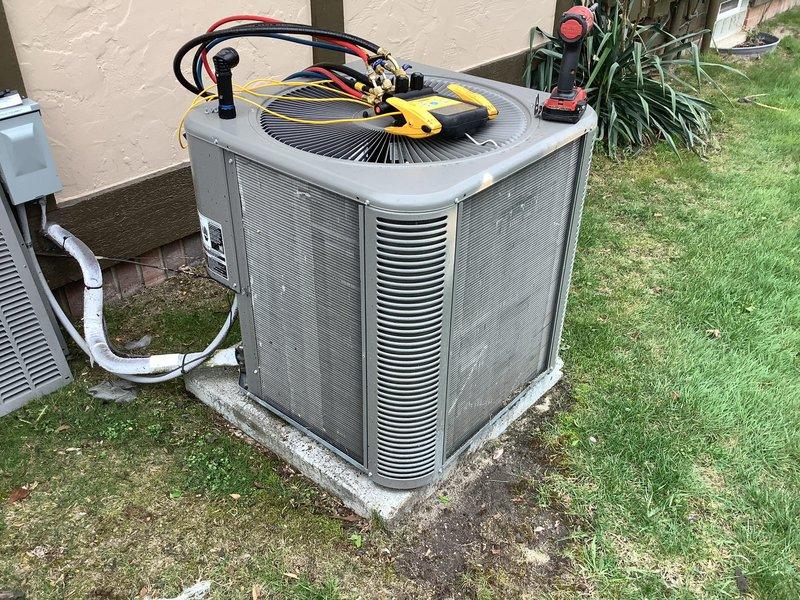 Completed annual cooling maintenance on Bryant residential air conditioning system. Performed comprehensive inspection of outdoor condenser unit, checked refrigerant pressures and temperatures using manifold gauges, verified proper operation of compressor and condenser fan motor, inspected electrical connections at disconnect box, and examined refrigerant line set for leaks or damage. Cleaned condenser coils, verified unit was level on concrete pad, and confirmed proper drainage from condensate line. System operating within manufacturer specifications with no issues identified.