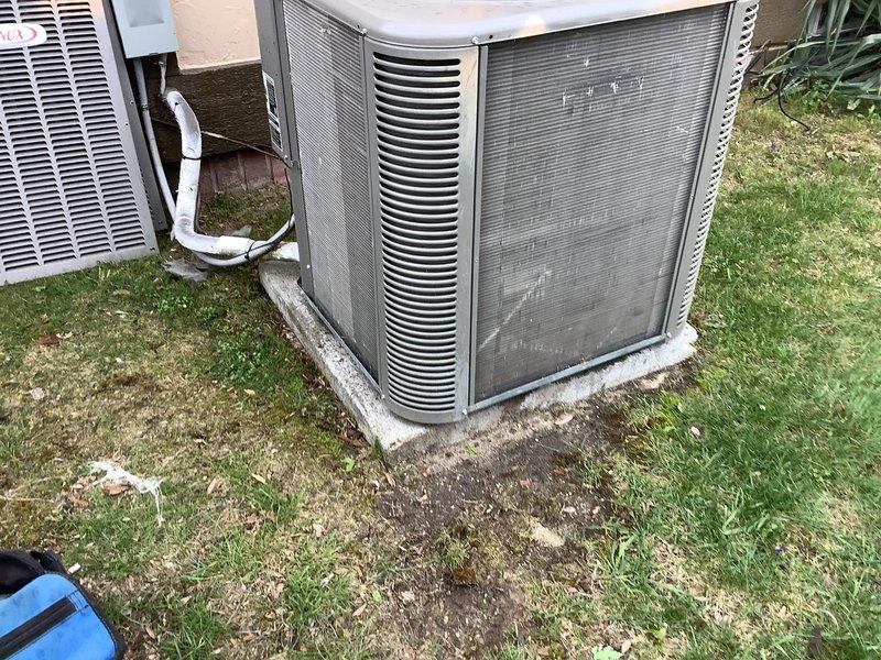 Completed annual cooling maintenance on Bryant residential air conditioning system. Performed comprehensive inspection of outdoor condenser unit, checked refrigerant pressures and temperatures using manifold gauges, verified proper operation of compressor and condenser fan motor, inspected electrical connections at disconnect box, and examined refrigerant line set for leaks or damage. Cleaned condenser coils, verified unit was level on concrete pad, and confirmed proper drainage from condensate line. System operating within manufacturer specifications with no issues identified.