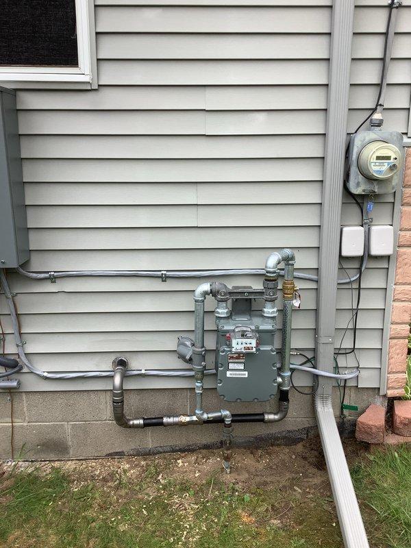 Successfully installed a 20kW RCA standby generator with a 100-amp automatic transfer switch, including all necessary electrical connections, gas piping, and pressure testing to ensure system integrity. All required permits were obtained for mechanical, electrical, generator, gas pipe, pressure test, and transfer switch components prior to installation. The unit was mounted on an exterior concrete pad with proper conduit routing, gas meter integration, and electrical service connections completed to manufacturer specifications and local code requirements.