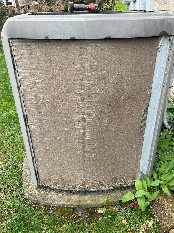 Completed routine air conditioning maintenance on residential split system. Inspected outdoor condenser unit and found coils heavily clogged with dirt, dust, and debris accumulation. Cleaned condenser coils to restore proper airflow and heat transfer efficiency. Replaced air filter and evaporator pad as needed. Performed electrical diagnostics using digital multimeter to verify system operation and amperage draw. Unit tested and left in proper working condition.
