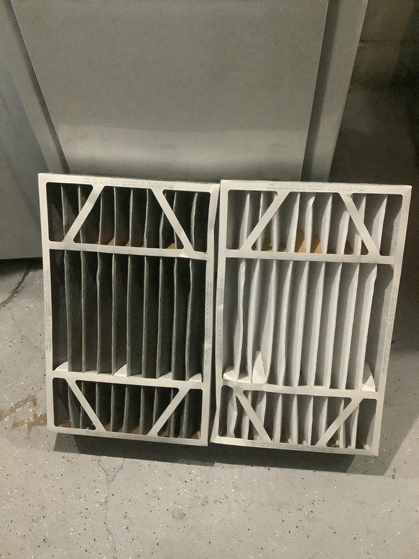 Completed annual cooling maintenance on residential split system. Performed comprehensive inspection of condensing unit and air handler, checked refrigerant levels, verified electrical connections, tested thermostat operation, and confirmed proper system airflow. Documented existing air filters showing normal dust accumulation; filters were photographed for records but replacement was not required at this time per maintenance schedule.