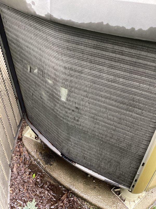 Completed annual preventative maintenance on 15-year-old air conditioning system per maintenance agreement. Performed comprehensive AC tune-up including inspection of outdoor condenser unit, verified proper operation of all components, and confirmed system functionality. Condenser coils showed typical environmental exposure with dirt accumulation on fins; unit operating within normal parameters with no immediate repairs required at this time.
