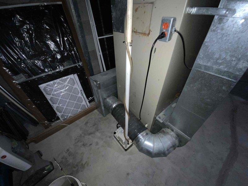 Provided estimate for complete furnace and air conditioning system replacement in basement location. Existing 1990s-era furnace still operational but air conditioning unit previously removed. Assessment included evaluation of existing ductwork, electrical connections, and basement mechanical room layout to determine equipment specifications and installation requirements for new HVAC system under BOGO promotion.