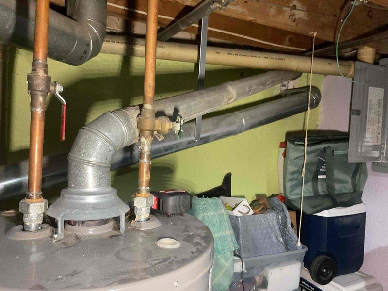 Conducted on-site assessment for complete air conditioning system replacement to address non-functional 30+ year-old unit currently located at rear of property. Evaluated basement furnace configuration with natural gas fuel source and existing ductwork infrastructure. Provided comprehensive replacement quote including options for relocating outdoor condensing unit to front of property per homeowner request, with equipment specifications and installation requirements for both standard replacement and relocation scenarios.