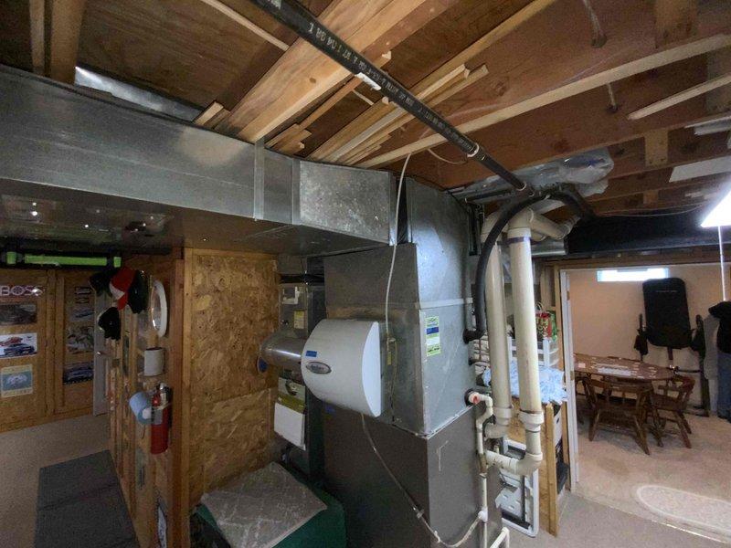 Provided comprehensive estimate for replacement of 25+ year old furnace and air conditioning system currently located in basement. Existing natural gas furnace and outdoor condensing unit are operational but have exceeded expected service life. Recommended complete HVAC system replacement including new high-efficiency natural gas furnace, evaporator coil, and outdoor condensing unit to improve reliability, energy efficiency, and maintain consistent comfort throughout the home.