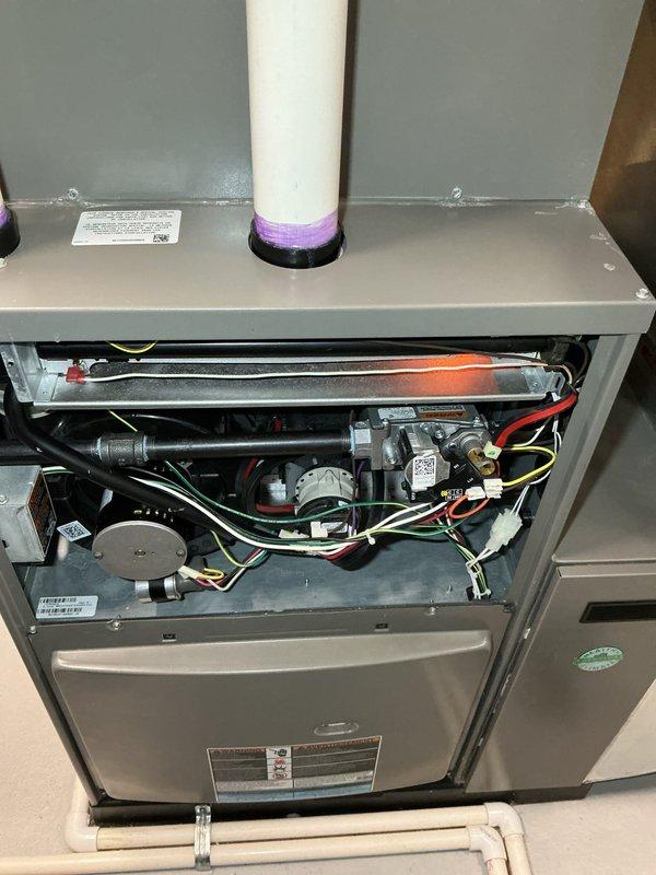 Completed ComfortGuard Maintenance Package on air handling unit per customer request. Performed comprehensive inspection of furnace system, including examination of heat exchanger, gas valve assembly, blower motor, electrical connections, and condensate drain system. All internal components were assessed for proper operation, wiring connections were verified secure, and unit was found to be functioning within normal parameters with typical operational dust accumulation present.