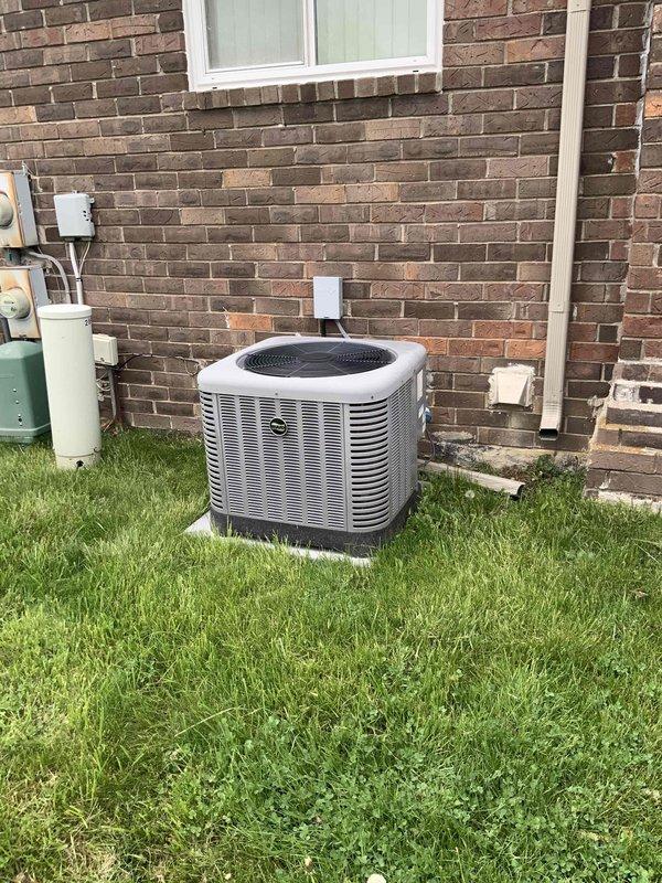 Completed full system estimate for residential HVAC replacement. Evaluated 15-year-old air conditioning unit with confirmed refrigerant leak at outdoor condenser and 15-year-old furnace with intermittent operational failures. Assessed humidifier experiencing water leakage issues. Documented existing equipment configuration including outdoor condenser unit on concrete pad, basement-installed furnace with metallic venting, and integrated humidification system. Photographed current system conditions and installation layout. Provided comprehensive replacement options for complete HVAC system due to age of equipment and multiple component failures requiring immediate attention within customer's one-month timeline.