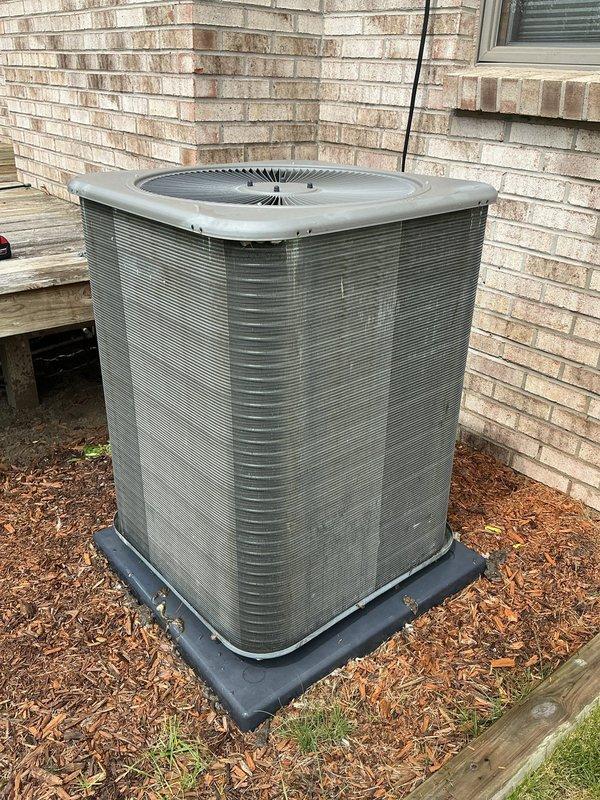 Completed annual cooling maintenance on residential split system air conditioning unit. Performed comprehensive inspection of outdoor condenser unit, noting moderate dirt and debris accumulation on exterior casing and coil surfaces. Cleaned condenser coils and exterior housing to restore proper airflow and heat transfer efficiency. Verified fan operation and inspected electrical connections. System operating within normal parameters upon completion of maintenance service.