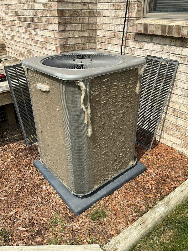 Completed annual cooling maintenance on residential split system air conditioning unit. Performed comprehensive inspection of outdoor condenser unit, noting moderate dirt and debris accumulation on exterior casing and coil surfaces. Cleaned condenser coils and exterior housing to restore proper airflow and heat transfer efficiency. Verified fan operation and inspected electrical connections. System operating within normal parameters upon completion of maintenance service.