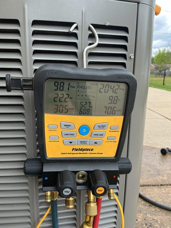 Performed routine Air Care Maintenance on residential cooling system. Inspected outdoor condensing unit, verified proper operation, and measured refrigerant pressures and temperatures using digital manifold gauges, confirming system performance within manufacturer specifications.