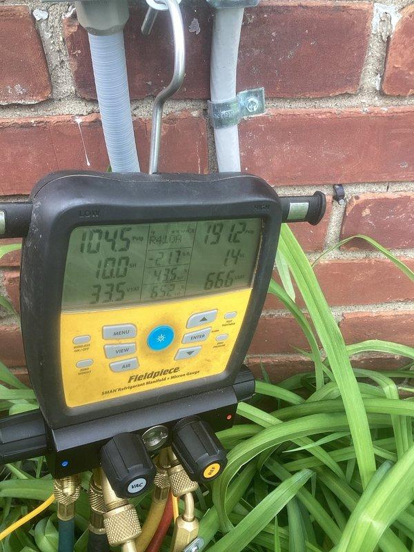 Completed scheduled maintenance on residential air conditioning system. Performed system diagnostics using digital manifold gauges to verify refrigerant pressures and temperatures across all zones. Inspected outdoor condensing unit, noting normal operational wear on heat exchanger coils and cabinet components. Replaced air filters and evaporative cooling pads as part of routine maintenance protocol to maintain optimal system efficiency and air quality.