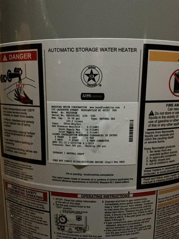 Successfully installed a 50-gallon Bradford White automatic storage water heater in the basement utility area. Completed all plumbing connections using copper piping with brass fittings, including installation of a red-handled ball valve for shutoff control. All connections were properly secured and tested for leaks to ensure safe operation.