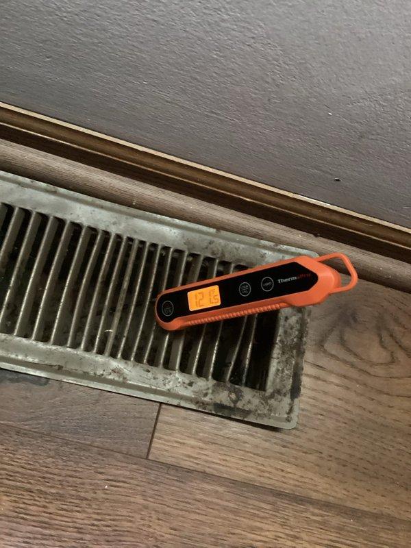 Responded to callback for 6-year-old furnace located in basement with no heat complaint. Unit was running but not delivering warm air to living spaces. Performed diagnostic testing and measured supply air temperatures at multiple registers throughout home to verify inadequate heat output. Identified issue related to previous service visit and completed necessary repairs under parts warranty coverage. Verified proper airflow and temperature rise across heat exchanger, confirmed all safety controls operating within specifications, and tested system through complete heating cycle to ensure restored functionality.