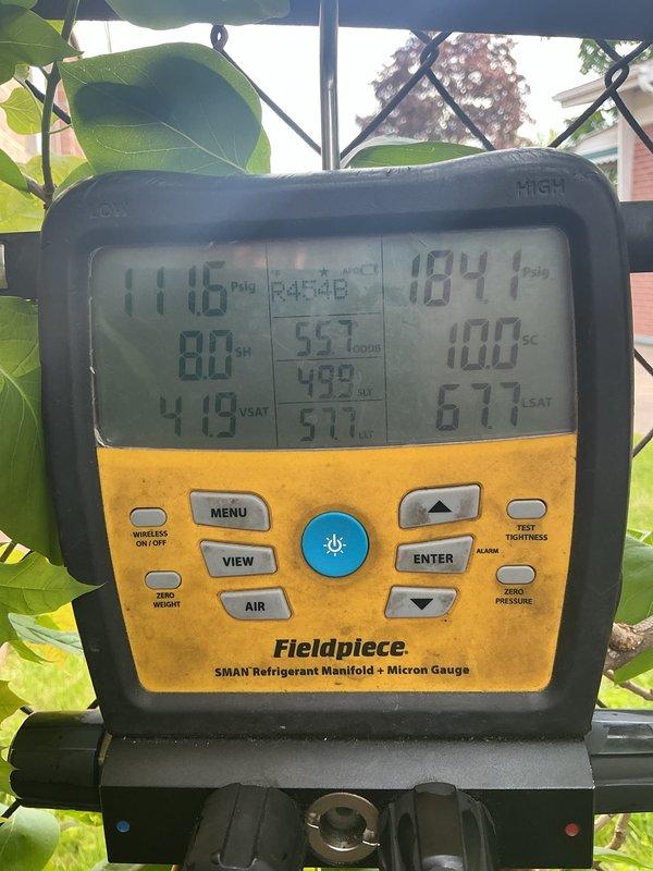 Responded to callback for 6-month-old air conditioning unit experiencing short cycling (4-minute intervals) and unusual noise that developed after earlier service visit same day. Upon arrival, performed comprehensive system diagnostics using Fieldpiece SMAN manifold gauge to measure refrigerant pressures, temperatures, and system performance parameters. Conducted thorough inspection of R-454B refrigerant system, checking for proper charge levels, pressures, and potential leaks. Utilized digital measurement tools to assess system temperatures and verify proper operation of components. Monitored superheat and subcooling values to ensure refrigerant charge was within manufacturer specifications. Identified and addressed the source of abnormal noise and short cycling condition. Verified all electrical connections, compressor operation, and control board functionality. System tested and confirmed operating properly with normal run cycles restored and noise eliminated.