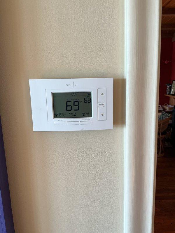 Performed comprehensive annual preventative maintenance on one-year-old residential central air conditioning system. Conducted complete system inspection including thermostat functionality verification, confirming proper temperature display and control operation at 69°F setpoint. Accessed indoor air handler unit, inspected all internal components including evaporator coil, blower assembly, electrical connections, and control boards. Verified UV light system operation and proper function of condensate drain lines and PVC piping connections. Checked all wiring connections for secure termination, inspected refrigerant lines for proper insulation and connections. System operating within normal parameters with no deficiencies noted. Unit confirmed in excellent condition with no repairs required at this time.