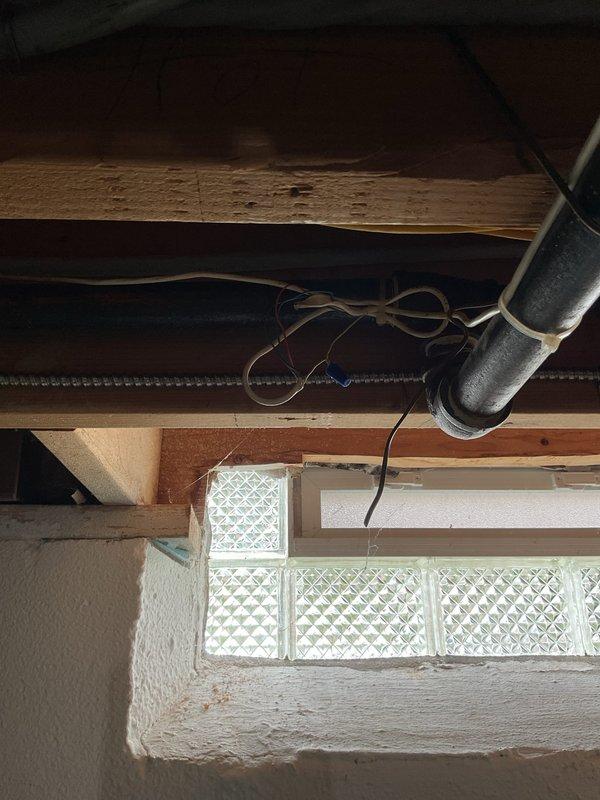 Responded to recall for air conditioning system that would not turn on. Upon arrival, inspected exterior electrical meters and service equipment mounted on building exterior. All utility meters appeared to be functioning properly with power supply intact. Proceeded to interior basement area and located HVAC equipment. Inspected electrical connections, circuit breakers, and low-voltage control wiring associated with the air conditioning system. Verified power supply to the unit and tested control circuits to identify the cause of the no-power condition. Restored proper operation to the air conditioning system.