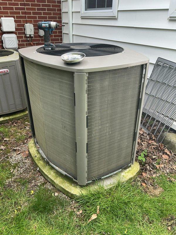 Completed routine maintenance on two air conditioning condenser units as part of recurring service agreement. Replaced two air filters per system requirements and performed standard ACM inspection protocols. Units showed signs of outdoor weathering with algae growth on concrete pads and equipment surfaces, though all systems remained operational throughout service visit.