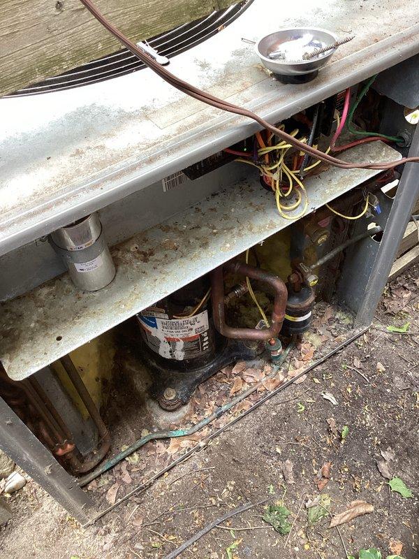 Completed annual cooling maintenance on residential split system air conditioning unit. Performed comprehensive inspection of outdoor condensing unit, checking all electrical connections, capacitors, and refrigerant lines. Cleaned debris from unit base and surrounding area. Verified proper operation of condenser fan motor and compressor. Inspected copper line sets for signs of wear or damage, noting normal oxidation on exposed piping. Checked electrical wiring integrity and capacitor functionality. System operating within normal parameters upon completion of maintenance service.