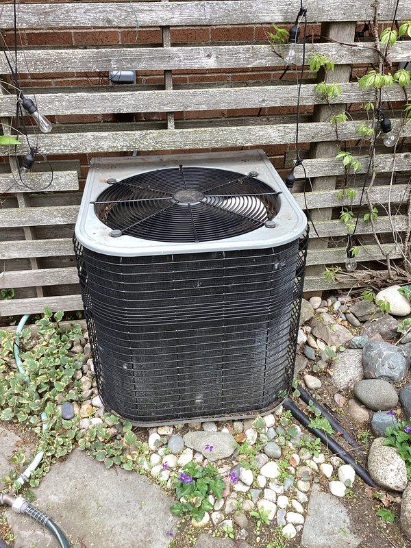 Completed annual cooling maintenance on residential split system air conditioning unit. Performed comprehensive inspection of outdoor condensing unit, checking all electrical connections, capacitors, and refrigerant lines. Cleaned debris from unit base and surrounding area. Verified proper operation of condenser fan motor and compressor. Inspected copper line sets for signs of wear or damage, noting normal oxidation on exposed piping. Checked electrical wiring integrity and capacitor functionality. System operating within normal parameters upon completion of maintenance service.